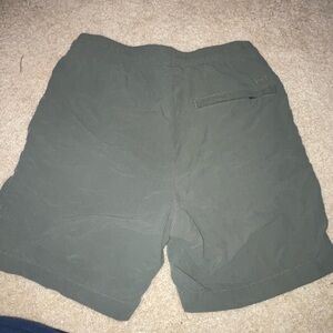 American eagle: Camo Green Men’s shorts with jaw strings to adjuste the waste.